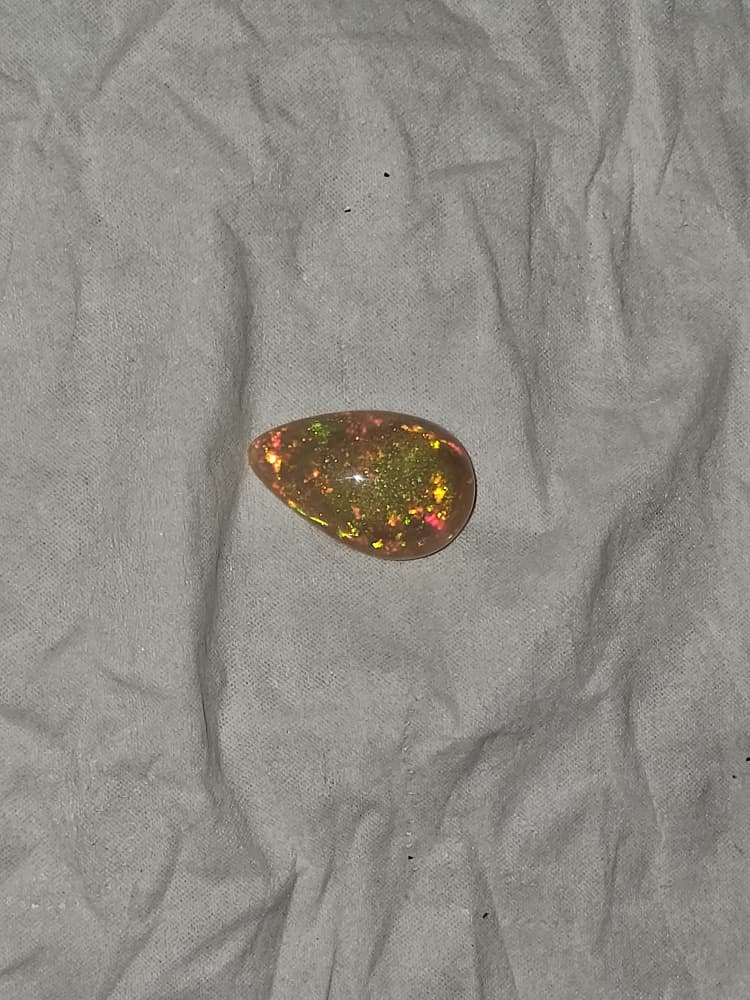 Welo — Rolling Flash Cabochon