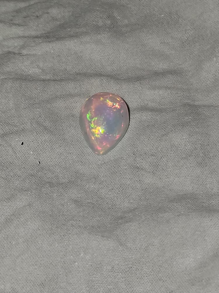 Welo — Rolling Flash Cabochon