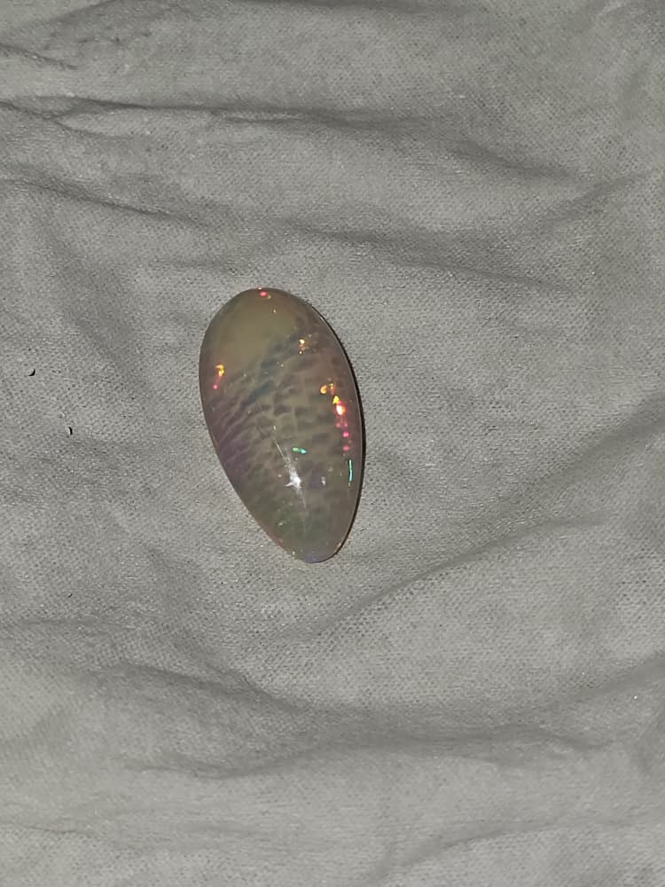 Welo — Rolling Flash Cabochon